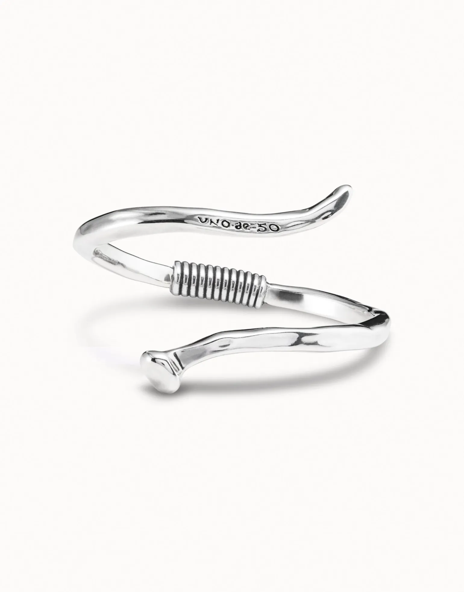 Bangle bracelet with a spiral-shaped nail