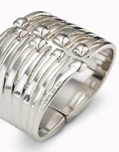 Bangle bracelet with multiple nail heads