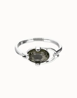 Bangle bracelet with oval faceted gray crystal