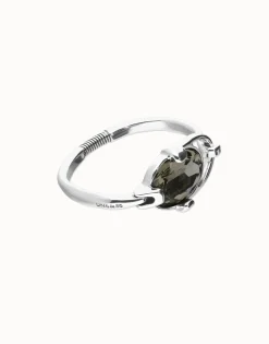 Bangle bracelet with oval faceted gray crystal