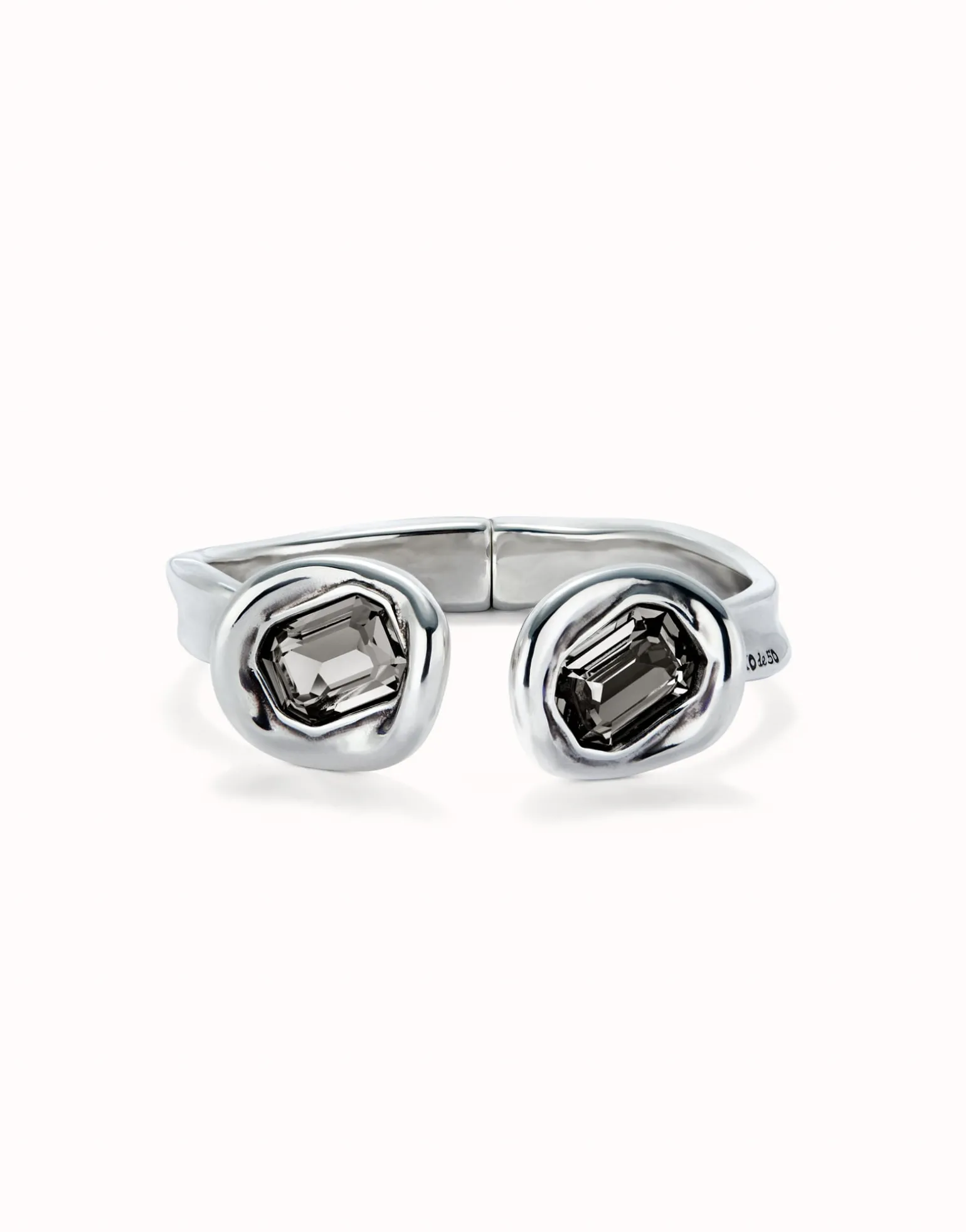 Bangle bracelet with two grey crystals