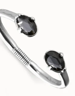 Bangle bracelet with two oval faceted black crystals