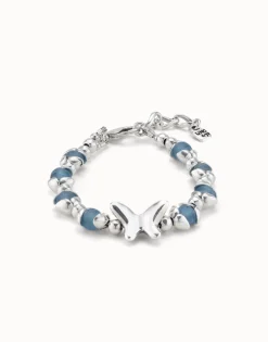 Beaded bracelet with blue crystals and a central butterfly
