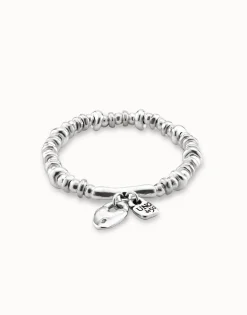 Beaded stretch bracelet with charms