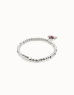 Beaded stretch bracelet with heart and pink crystal