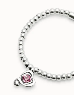 Beaded stretch bracelet with heart and pink crystal