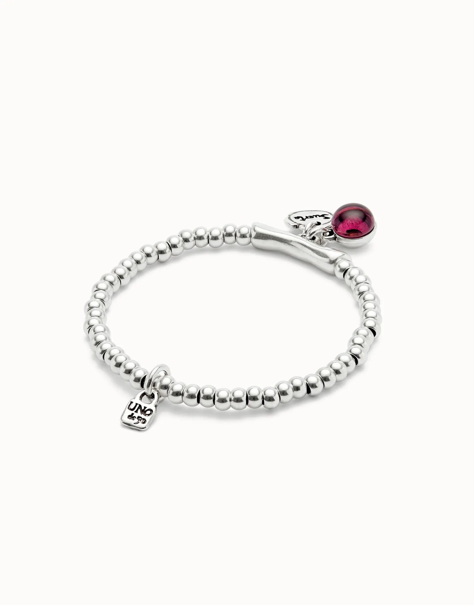 Beaded stretch bracelet with a murano glass and the word lucky