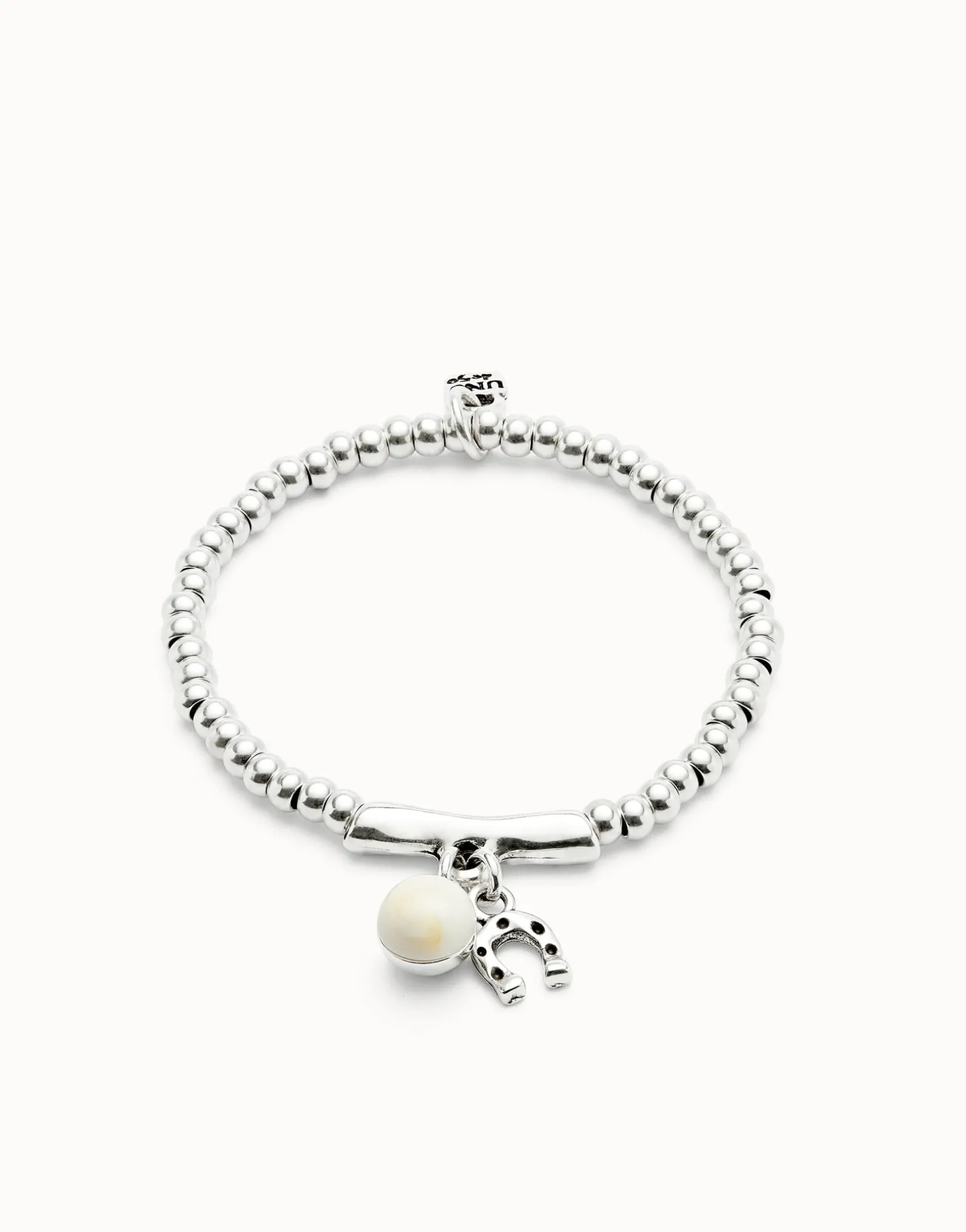 Beaded stretch bracelet with a murano glass and a horseshoe charm