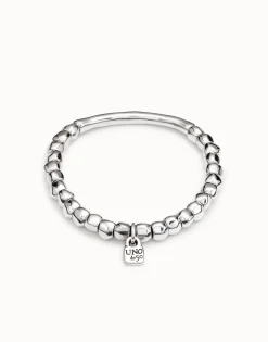 Beaded stretch bracelet with tubular piece