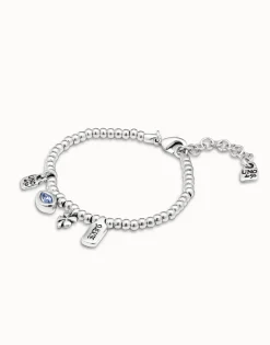 Beaded stretch bracelet with charms