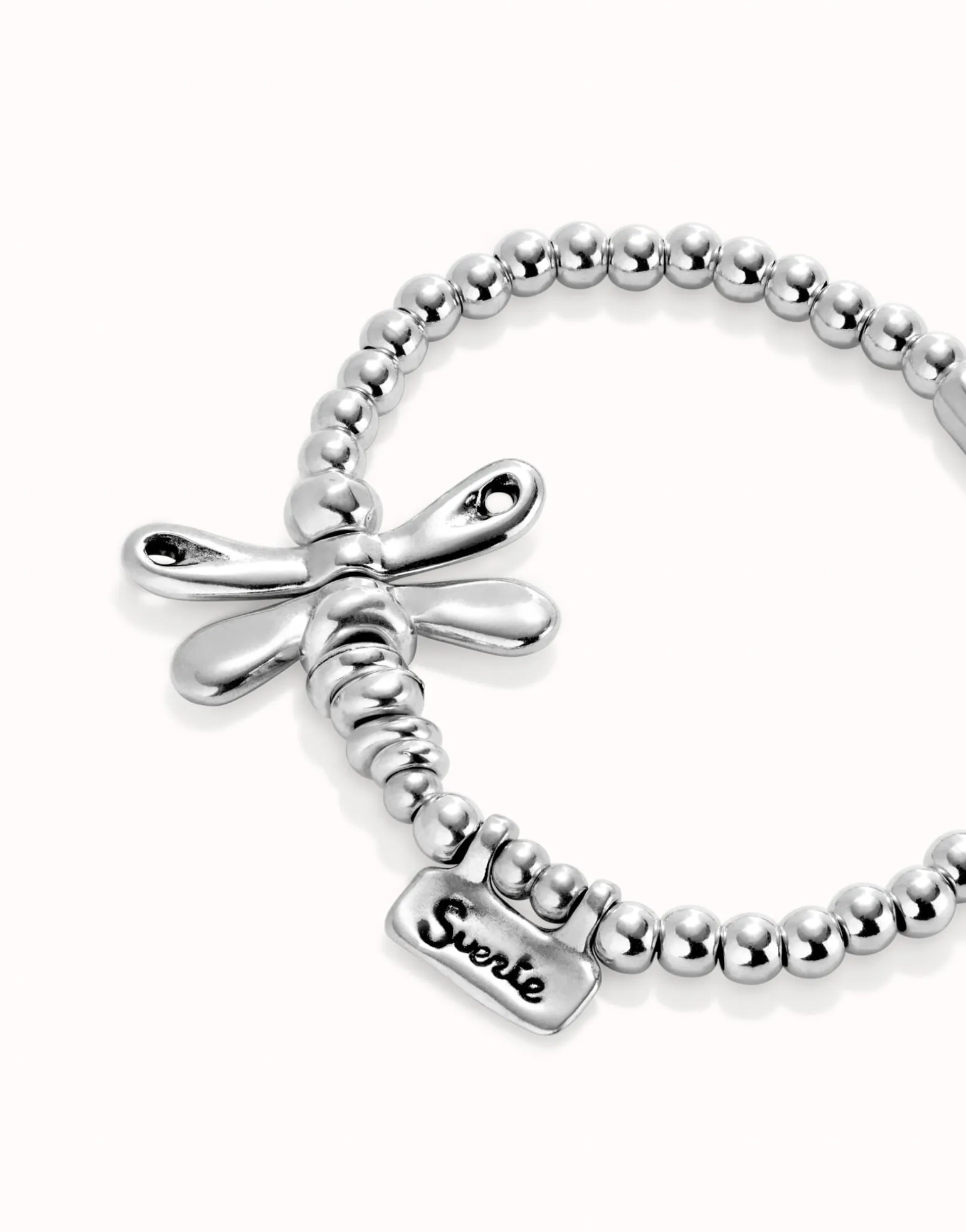 Beaded stretch bracelet with a dragonfly