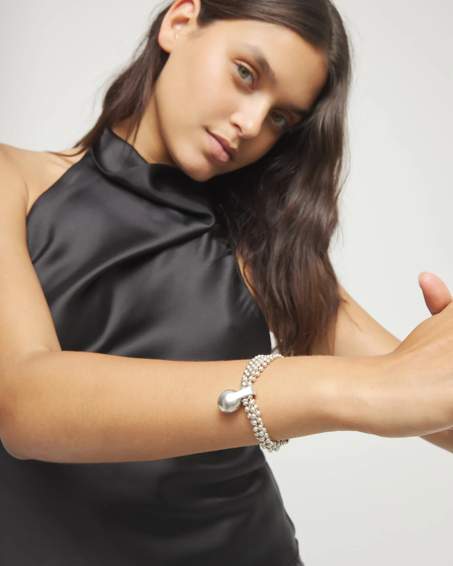 Bracelet with silver threads and large sphere