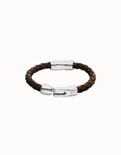 Brown braided leather bracelet with a metal detail