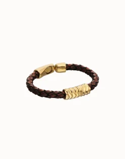 Brown braided leather bracelet with a metal detail