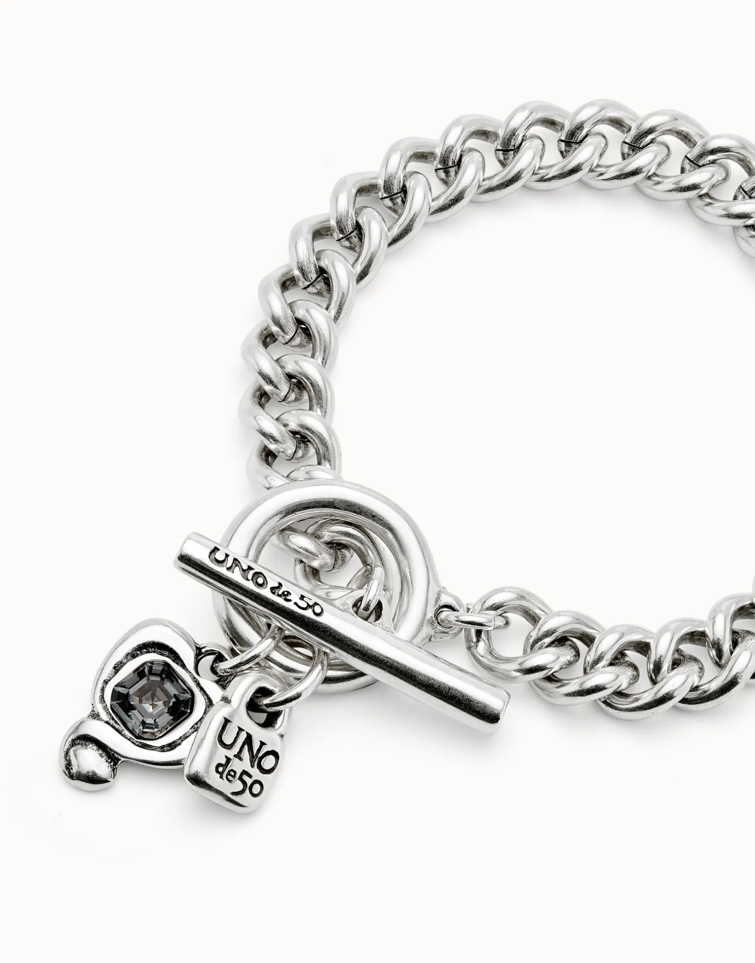 Curb link chain bracelet with charms