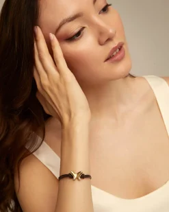 Double strand leather bracelet with a butterfly