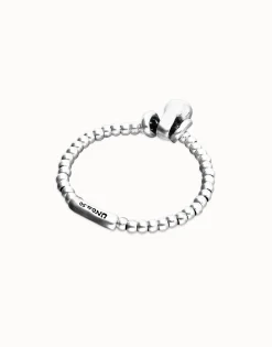 Elastic beaded bracelet with small and large beads