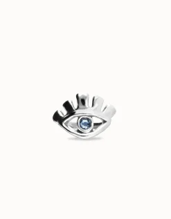 Eye-shaped ring with faceted blue crystal