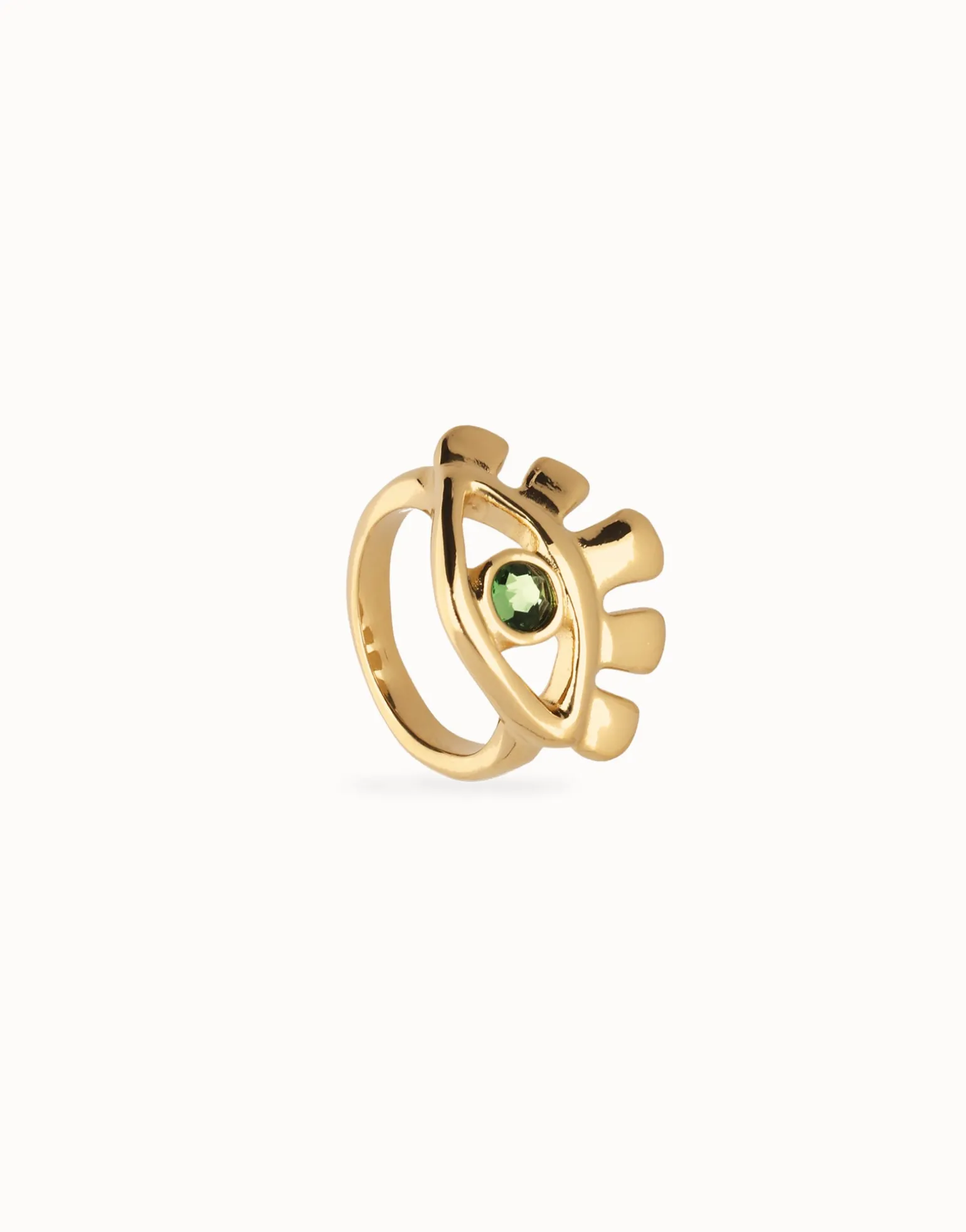 Eye-shaped ring with faceted green crystal
