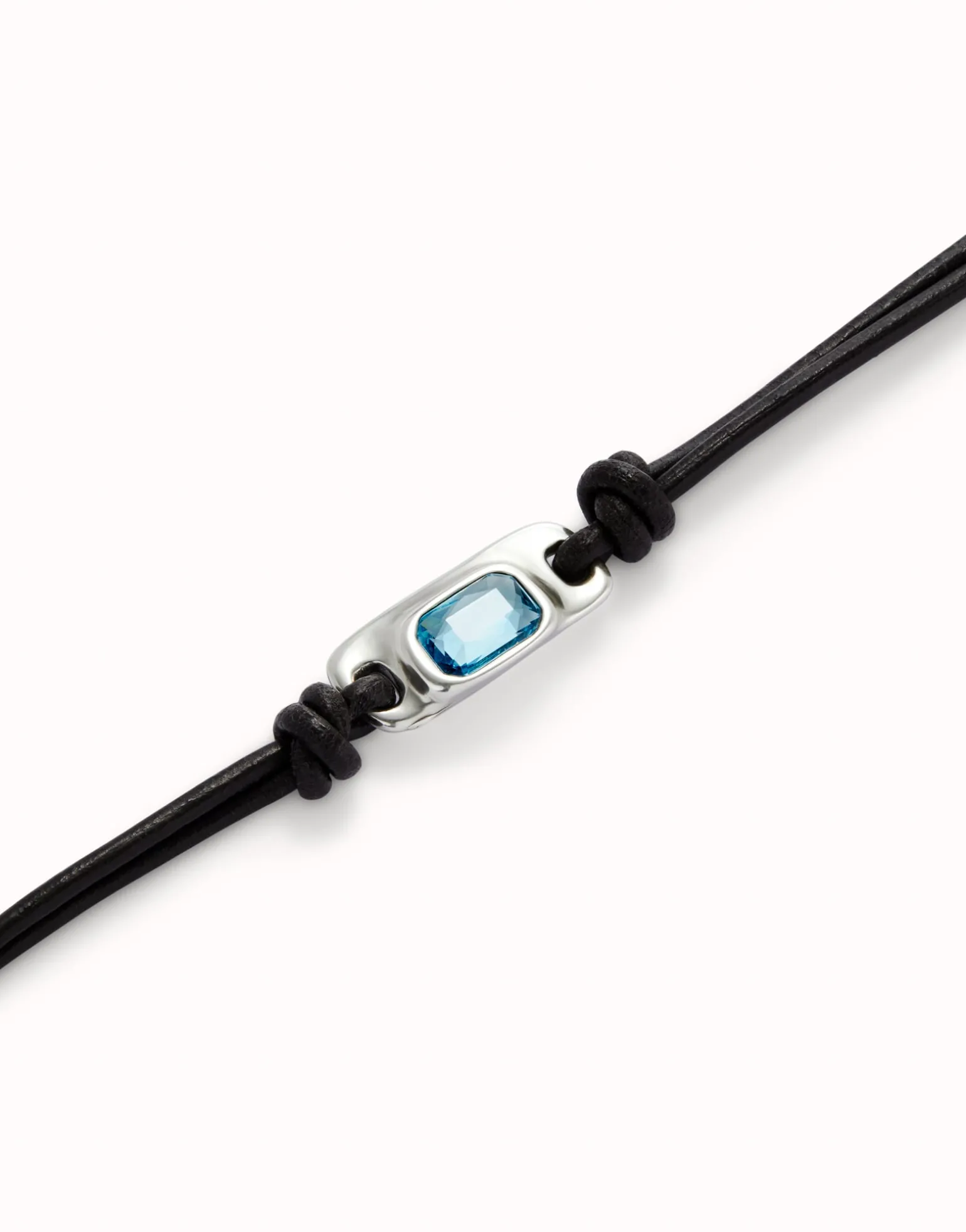 Leather bracelet with a blue crystal
