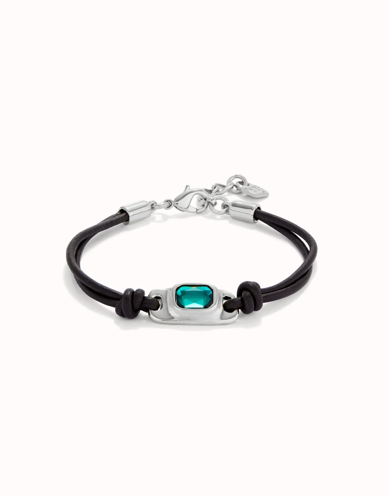 Leather bracelet with a green crystal