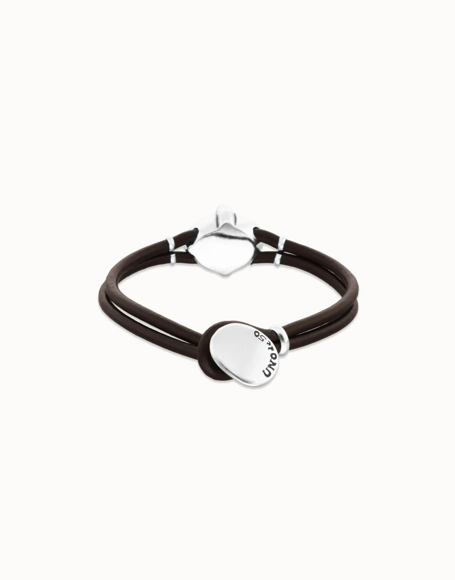 Leather bracelet with green oval faceted crystal