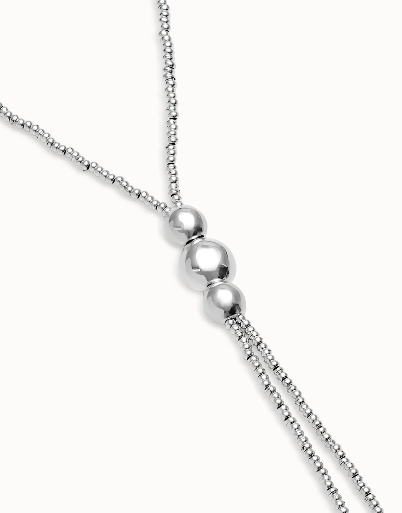 Long bead necklaces with three large central beads