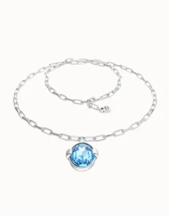 Long necklace with large blue oval faceted crystal