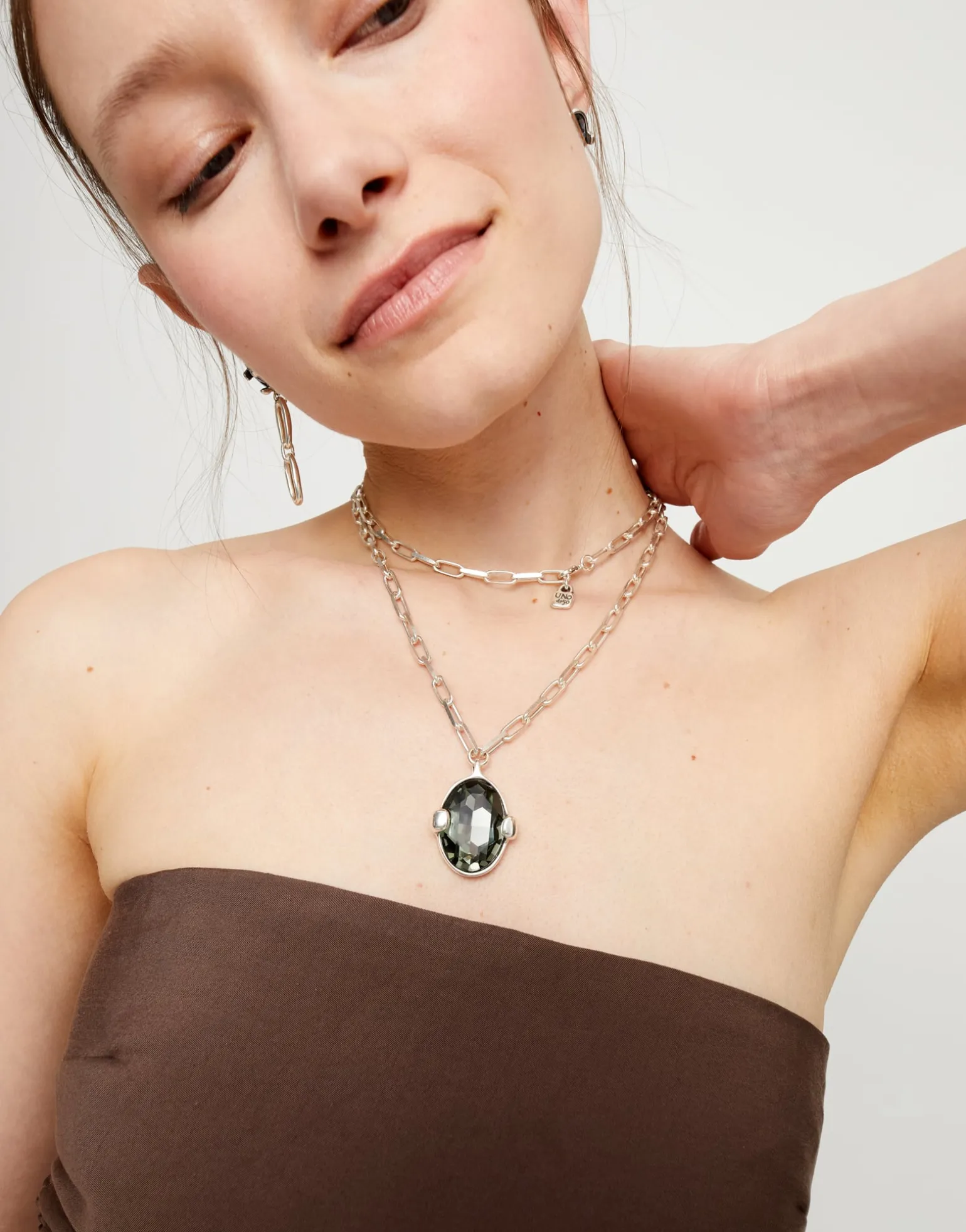 Long necklace with large gray oval faceted crystal