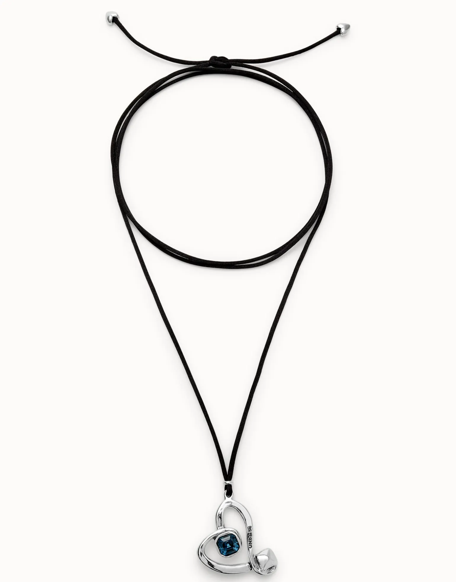 Long pendant and central heart with blue crystal