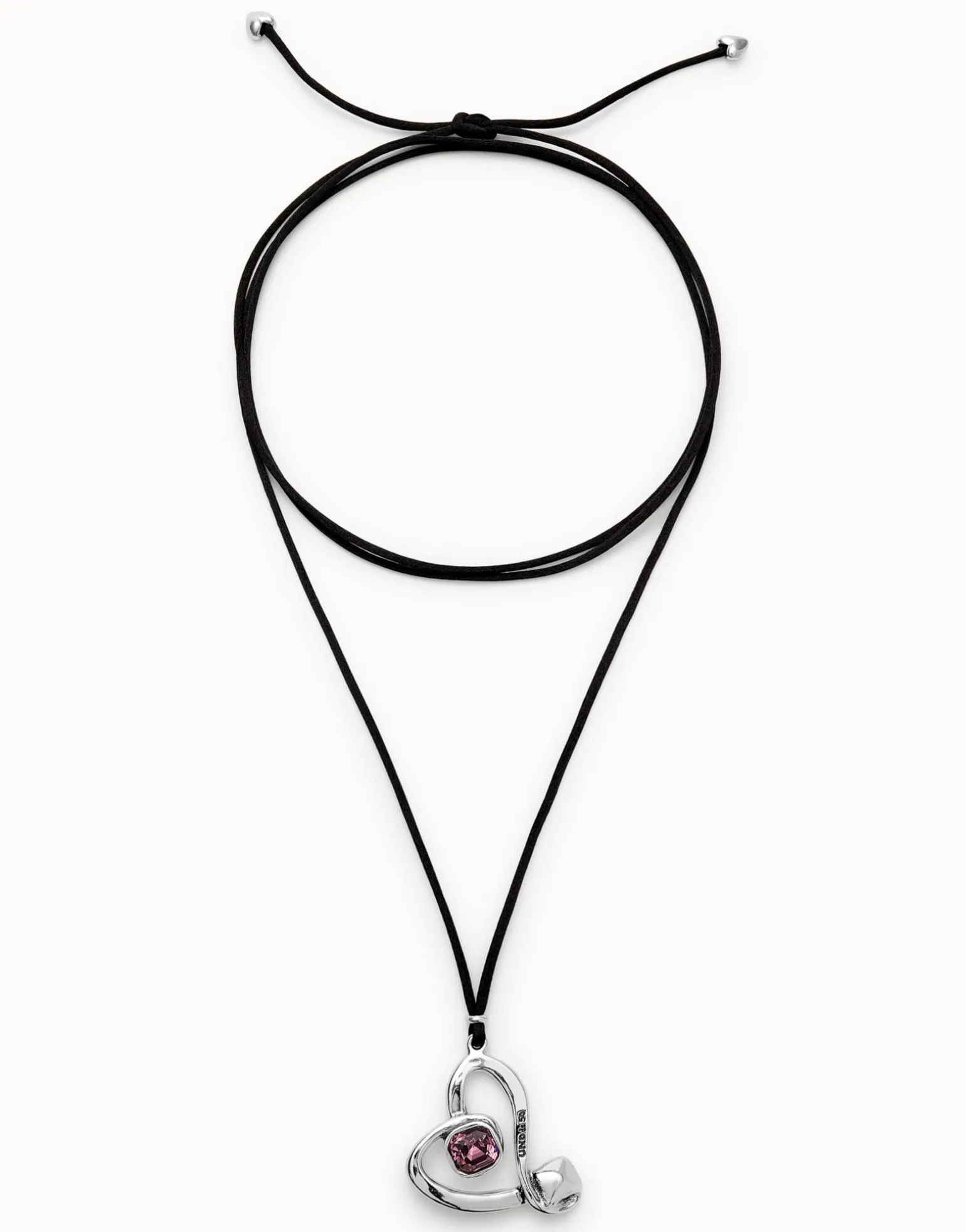 Long pendant and central heart with pink crystal