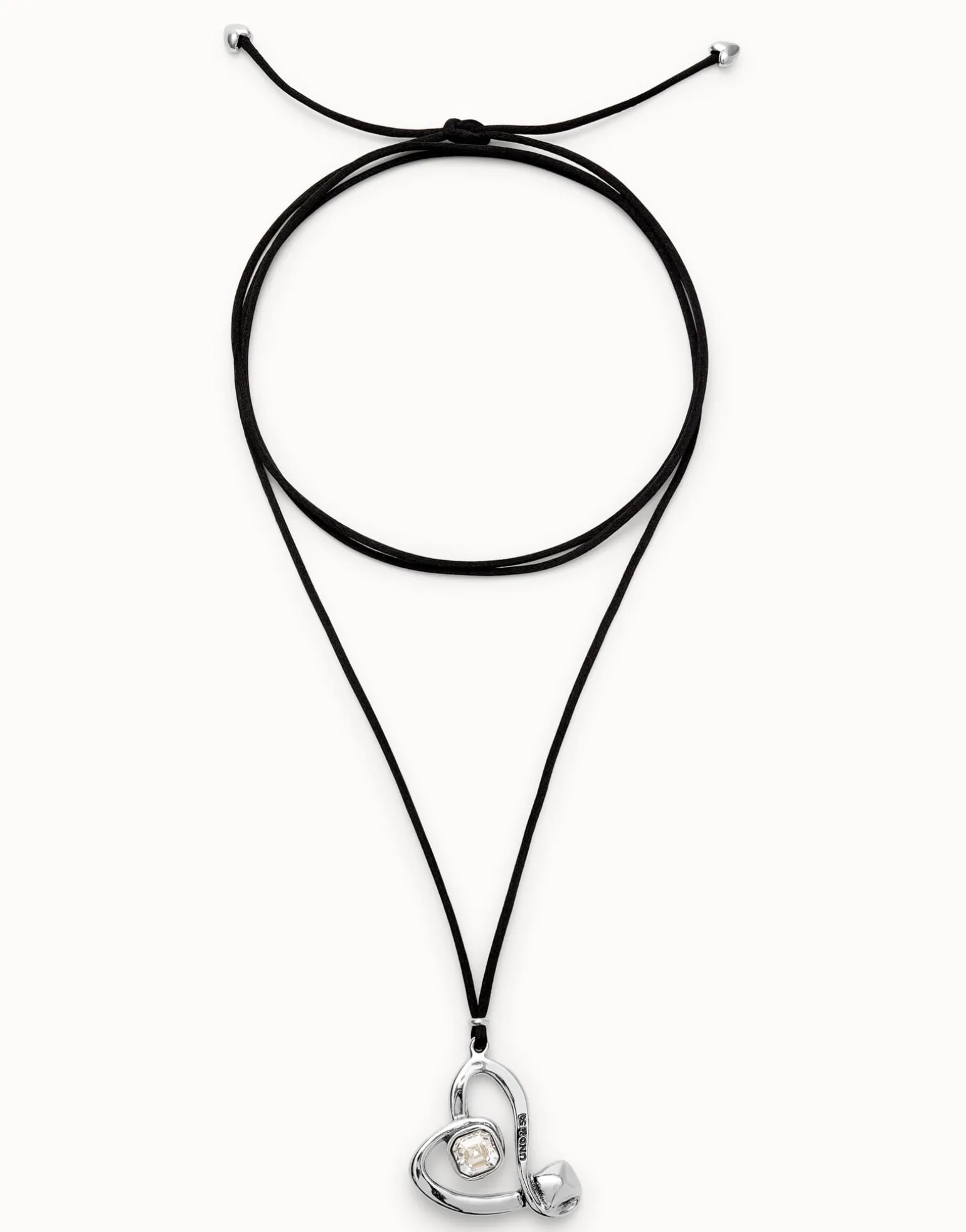 Long pendant and central heart with transparent crystal