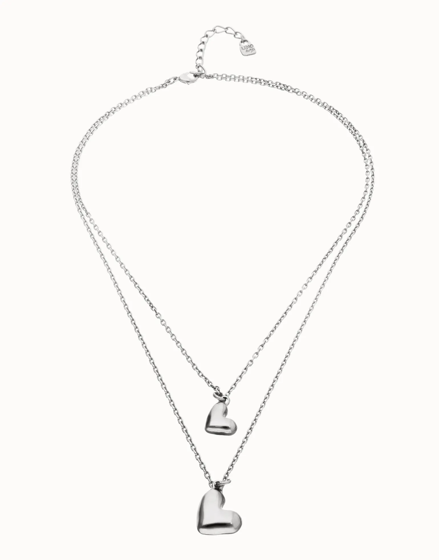 Multi strand chain necklace with two hearts