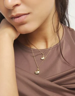 Multi strand chain necklace with two hearts