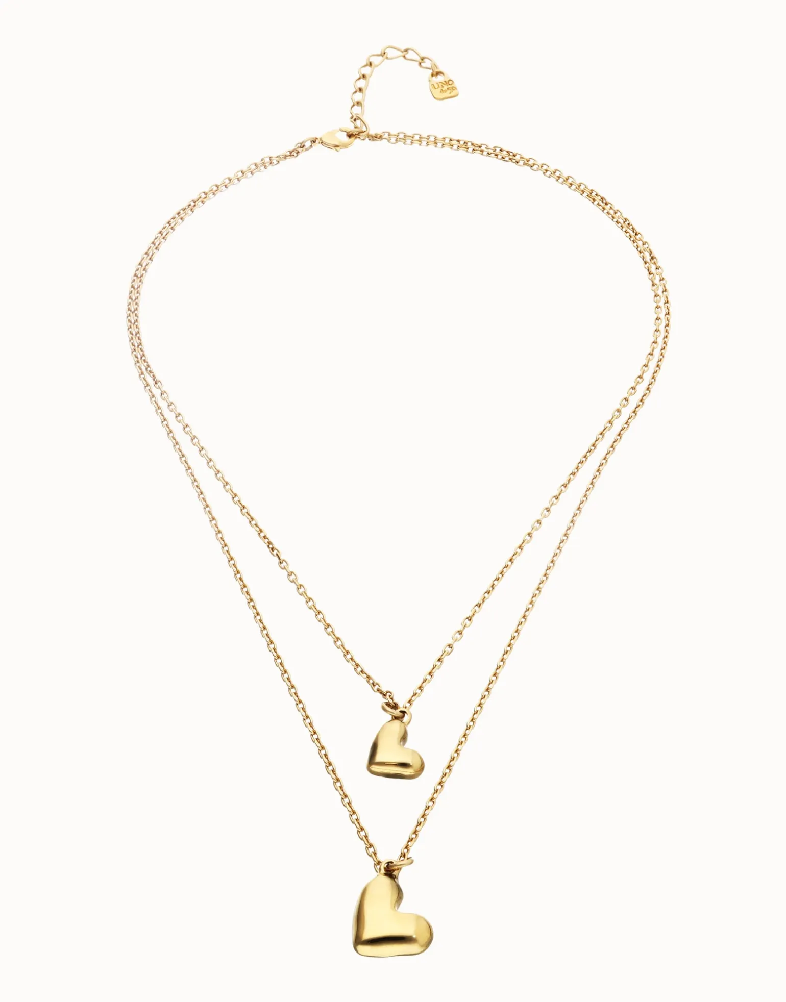Multi strand chain necklace with two hearts