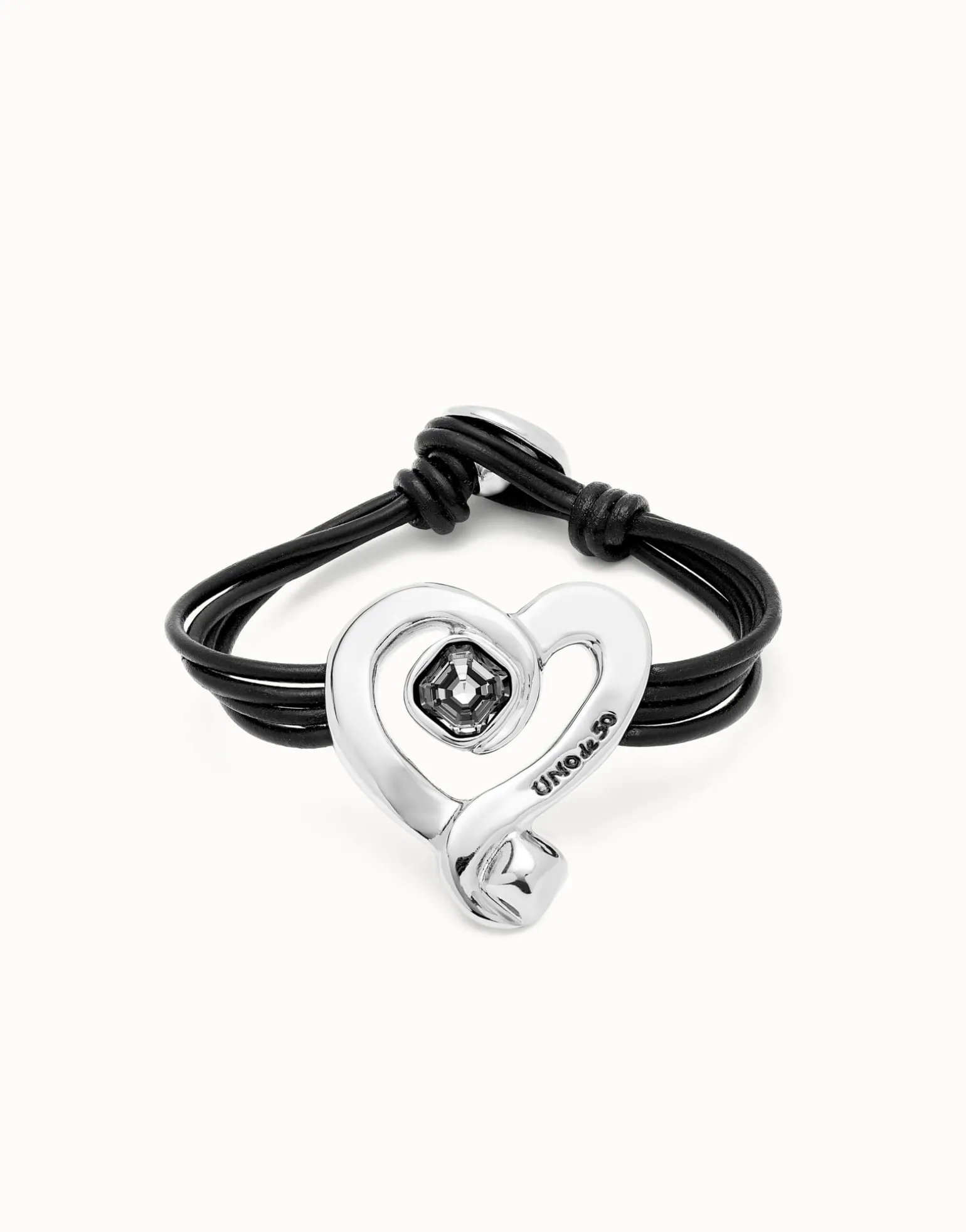 Multi strand leather bracelet with a heart