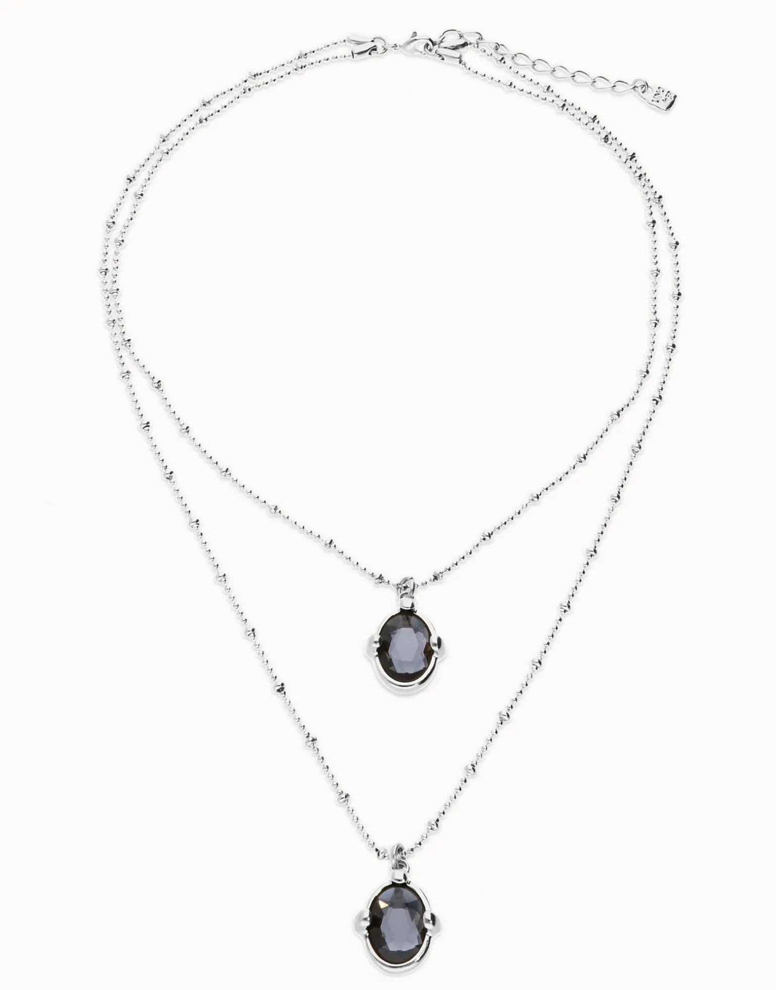 Multi strand necklace with two black oval faceted crystals