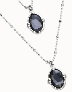 Multi strand necklace with two black oval faceted crystals
