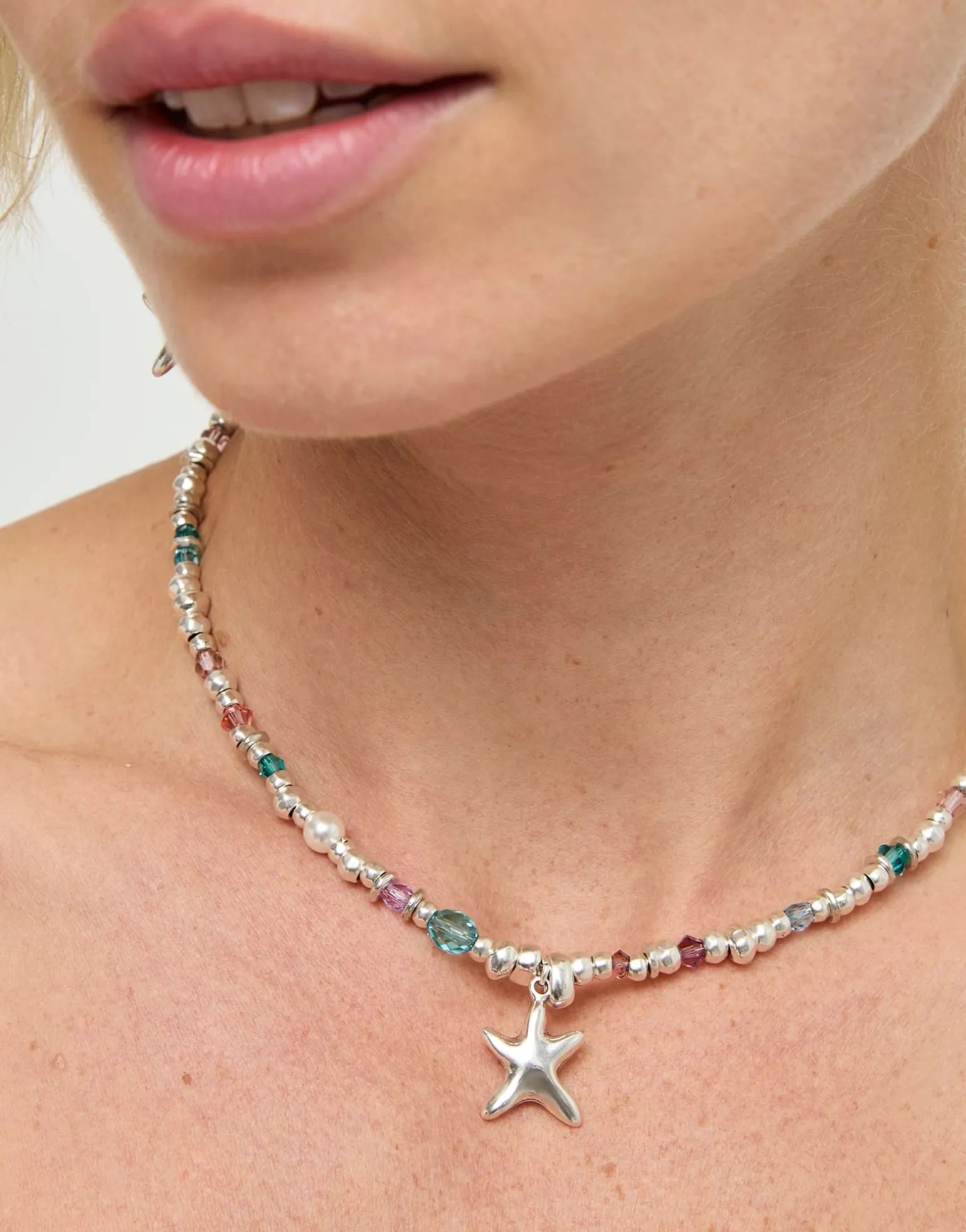Necklace with crystals and small starfish