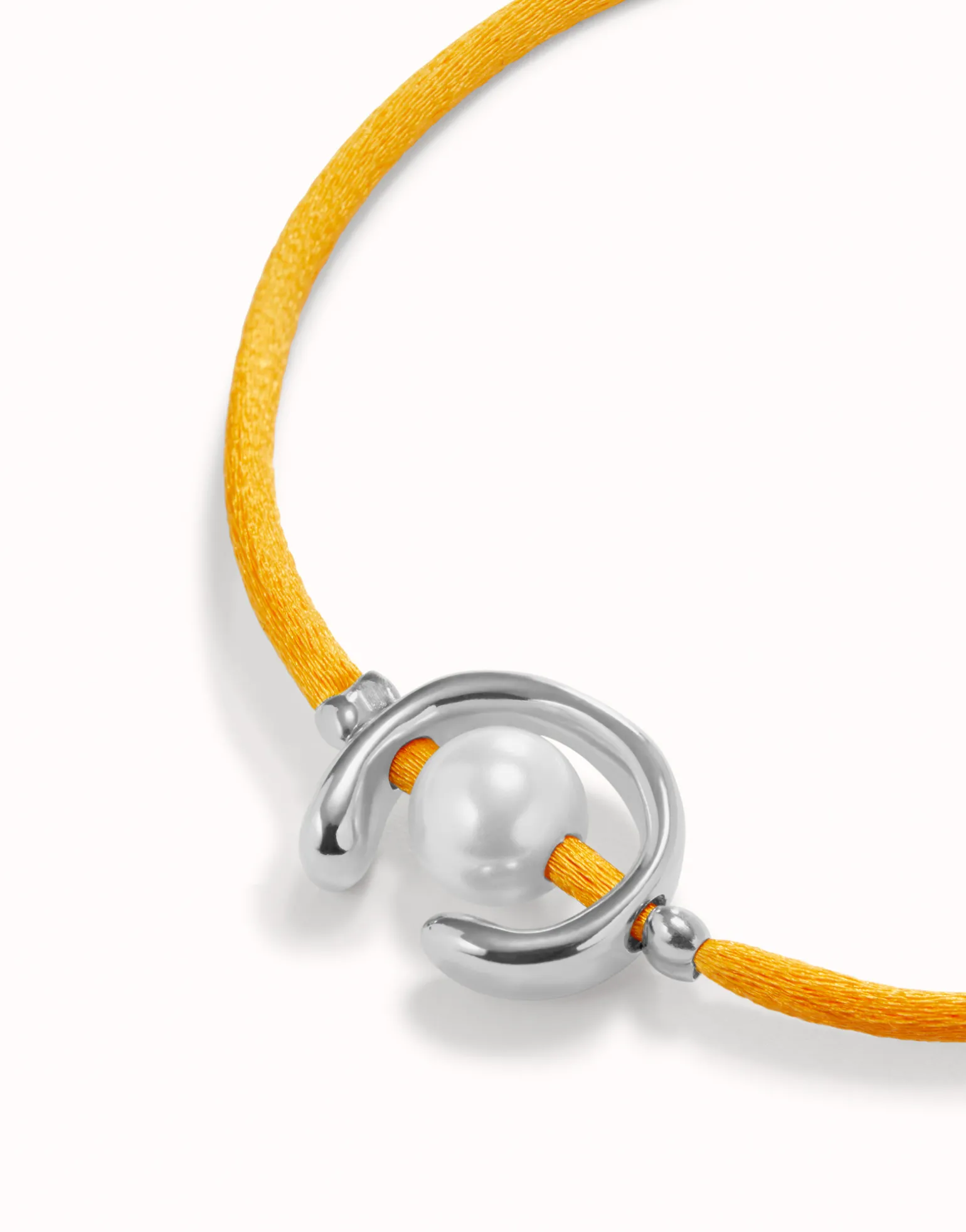 Orange cord bracelet with a pearl