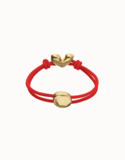Red elastic thread bracelet with heart