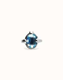 Ring with blue oval faceted crystal