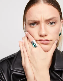 Ring with green crystal