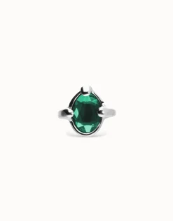 Ring with green oval faceted crystal