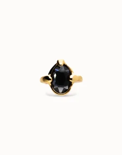 Ring with oval faceted black crystal