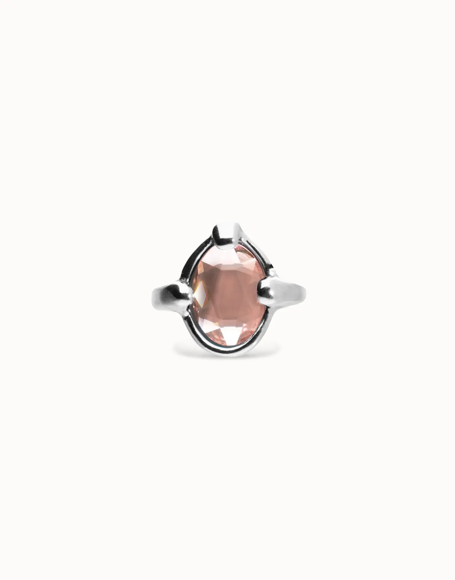 Ring with pink oval faceted crystal