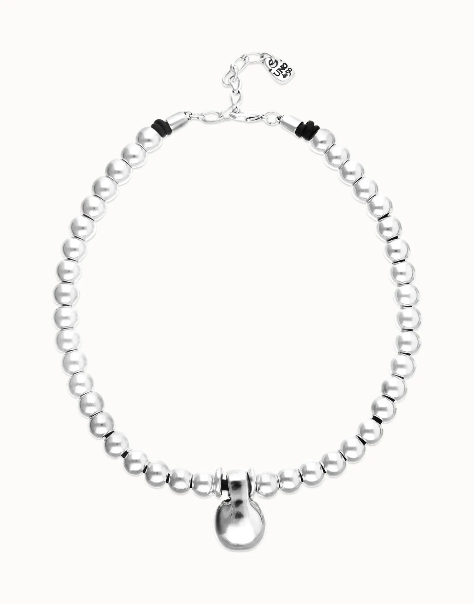Short beaded necklace with medium and a large sphere