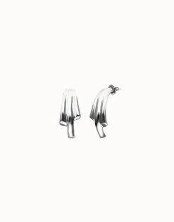 Stud earrings with elongated organic shapes