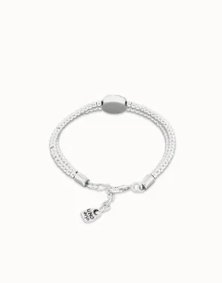 Two-strand beaded bracelet with an eye-shaped charm