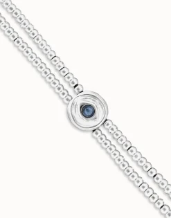 Two-strand beaded bracelet with an eye-shaped charm